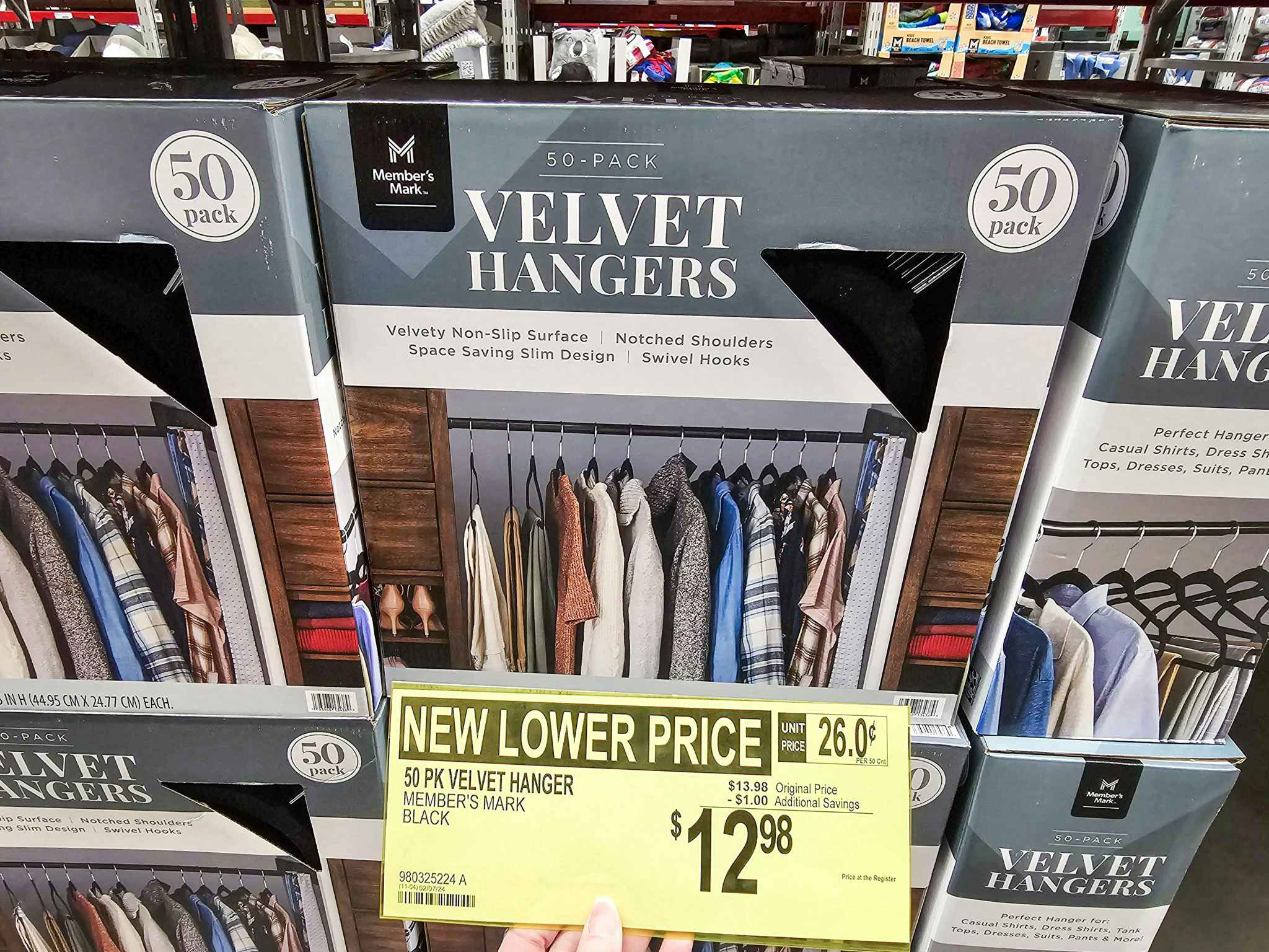 a sign for $12.98 for 50 packs of velvet hangers