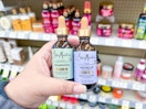 hand holding sheamoisture hair oil in walgreens