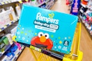 pampers baby dry diapers in dollar general shopping cart