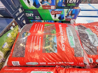 large bag of red rubber mulch