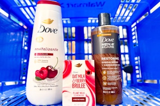 Dove body wash, milk bar, and Dove Men+Care body wash in a blue Walmart basket
