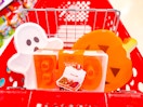 3 cook with color halloween storage boxes sitting in a target cart