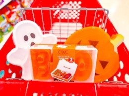 3 cook with color halloween storage boxes sitting in a target cart