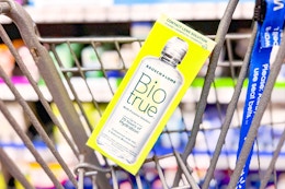 bottle of BioTrue contact solution in a Walmart cart