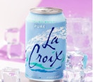 a blue can of sparkling water next to ice