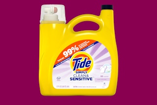 Person holding Tide Laundry Detergents