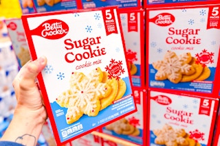 hand holding a box of betty crocker sugar cookie mix
