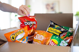 bag of chips being pulled out of a box