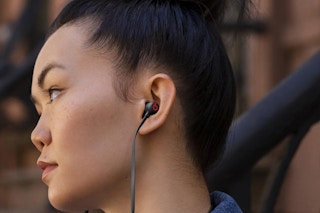 person wearing beats headphones