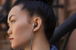 person wearing beats headphones