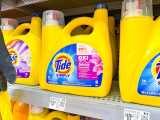 bottles of tide simply detergent on walmart shelf