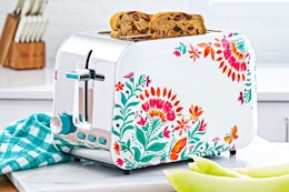 Lifestyle image of The Pioneer Woman 2-slice toaster in kitchen setting