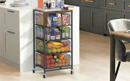 a 4-tier cart full of snacks in a kitchen