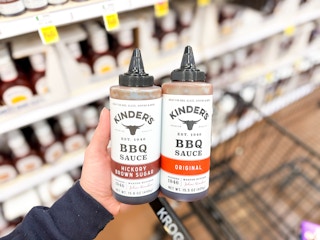 hand holding kinders sauces