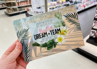 hand holding physicians formula dream team makeup palette