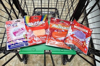 4 bath bombs in a cart: pez, skittles, hot tamales, and smarties themed