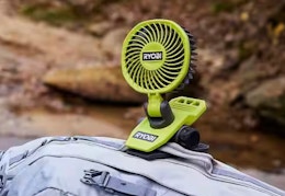 green and black clamp fan