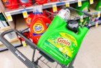 large tide and gain detergent bottles in a cart