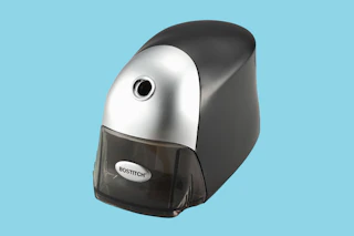 A Stanley Bostitch Electric Pencil Sharpener on a blue background