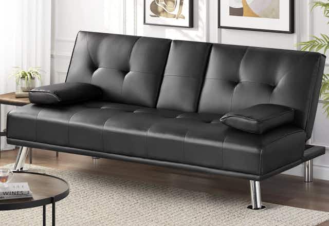 Faux Leather Futon With Cupholders and Pillows, Now $140 at Walmart card image