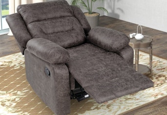 A gray suede-like oversized recliner in the recline position
