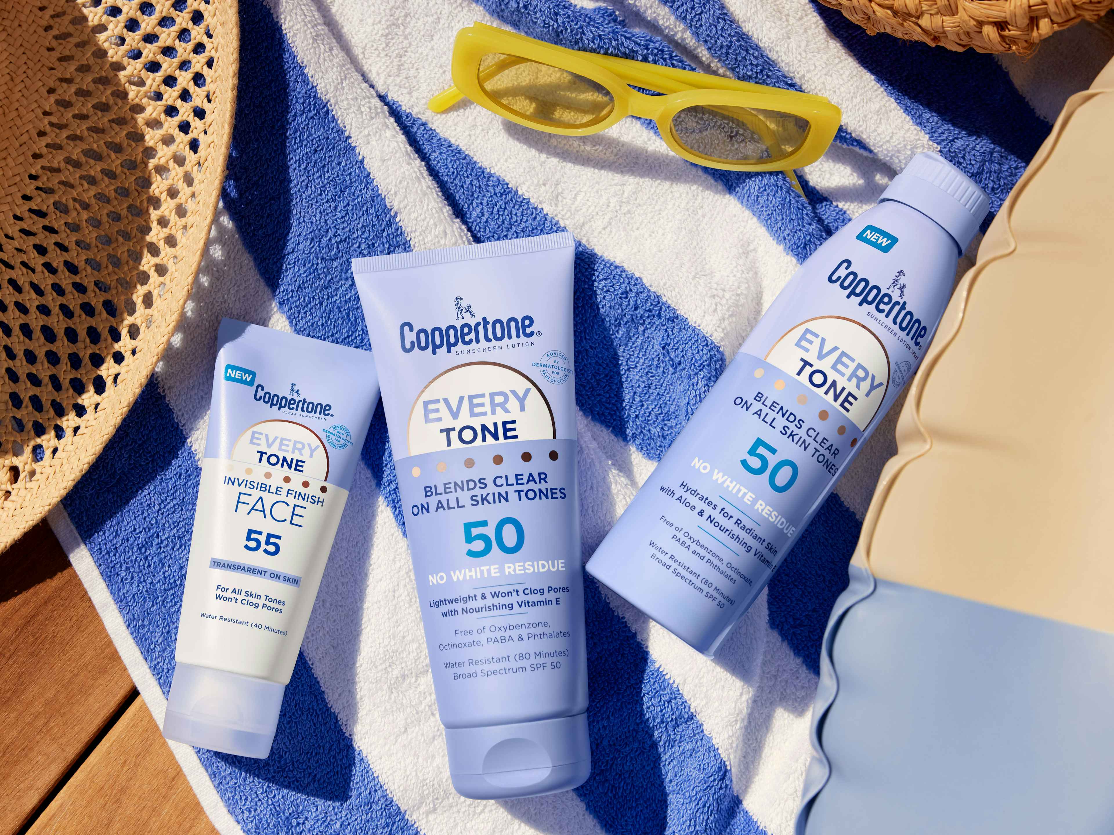 coppertone-sunscreen-beach-towel-sunglasses
