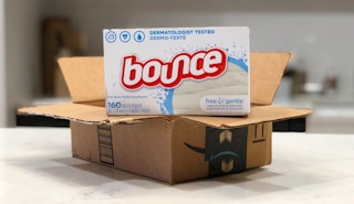 A box of Bounce Free & Gentle dryer sheets on top of an open Amazon box