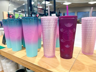 a variety of starbucks tumblers on target shelf