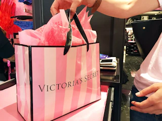 victorias secret shopping bag on counter