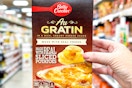 hand holding a box of betty crocker potatoes