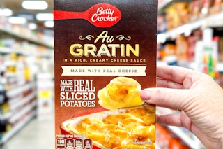 hand holding a box of betty crocker potatoes