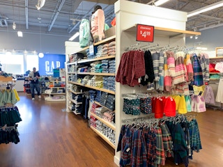 A clearance shelf of scarves in the Gap factory store.