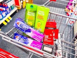cvs cart with garnier, crest, neutrogena, and maybelline items