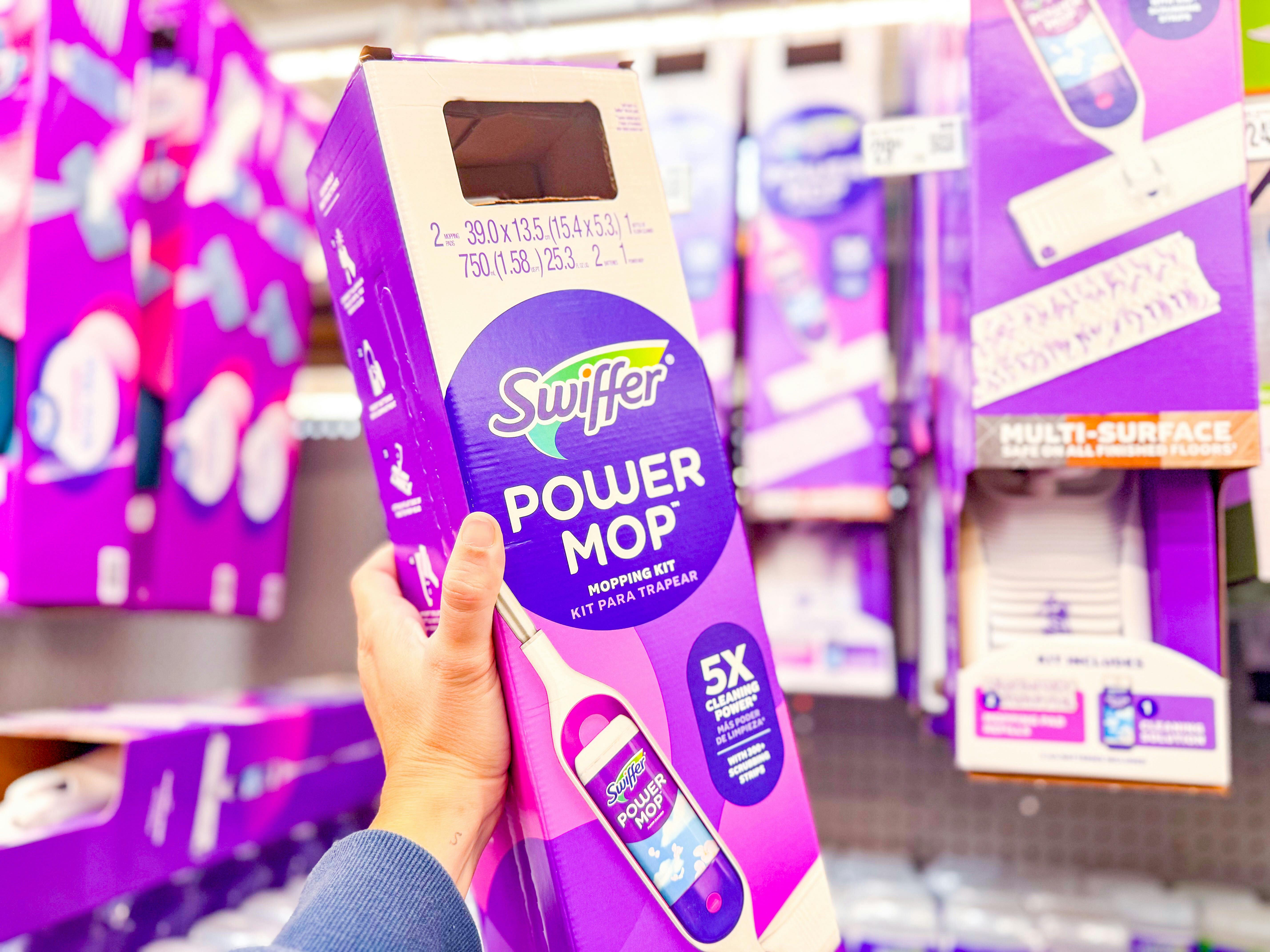 Swiffer Powermop Kit held up in Walmart store aisle (sponsored)