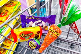 reeses and cadbury candy in a cart