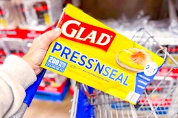 hand holding a pack of glad press'n seal
