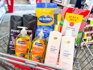 axe body wash, softsoap hand soap, dove shampoo, dr scholls insoles, and burts bees sheet masks in a cart