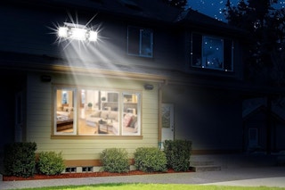 Solar Flood Light outside on a house