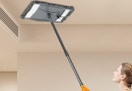 a wall duster cleaning a ceiling 