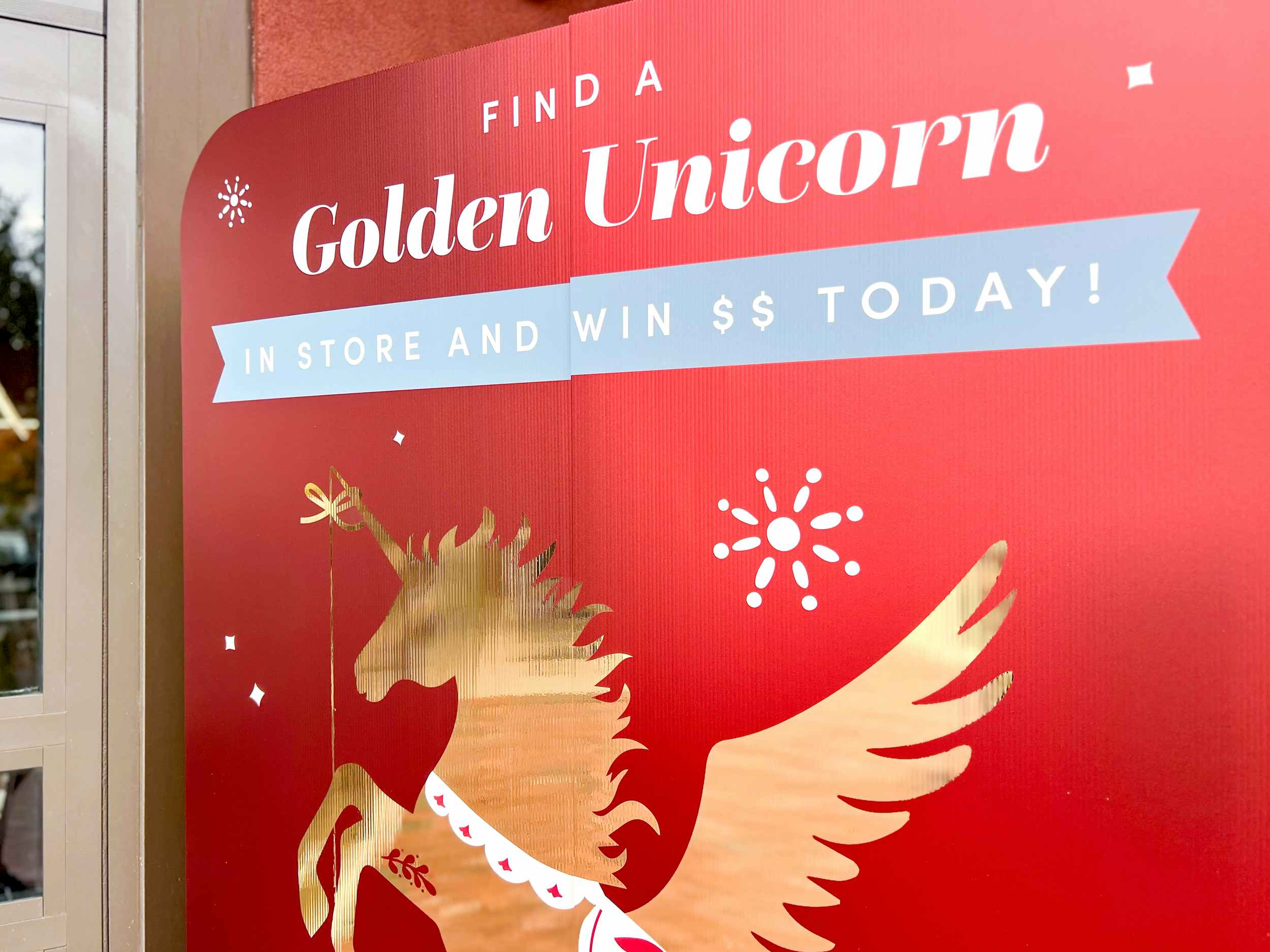 world market golden unicorn scavenger hunt signage
