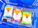Three Burts Bees Wipe Packs in Walmart shopping basket