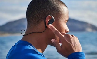 man wearing jbl headphones