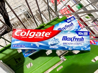 Colgate MaxFresh toothpaste in a cart