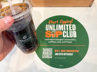 panera unlimited sips club sign with panera cup being held for free stuff 