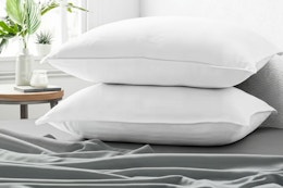 Lifestyle image (home setting on bed) of the Becky Cameron Plush Down Alternative Gel-Fiber Queen Pillows (2-Pack)