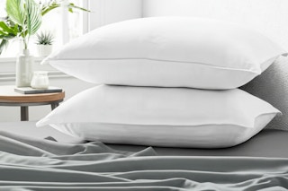 Lifestyle image (home setting on bed) of the Becky Cameron Plush Down Alternative Gel-Fiber Queen Pillows (2-Pack)