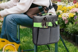 woman sitting of garden seat