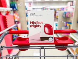 cricut easypress mini sitting on top a target cart