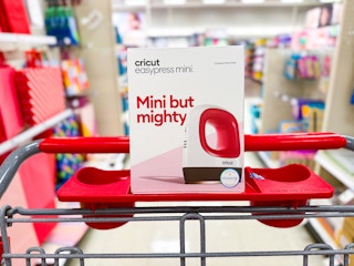 cricut easypress mini sitting on top a target cart