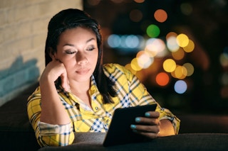 woman reading ebook ereader free ebooks 1675226122 1675226123